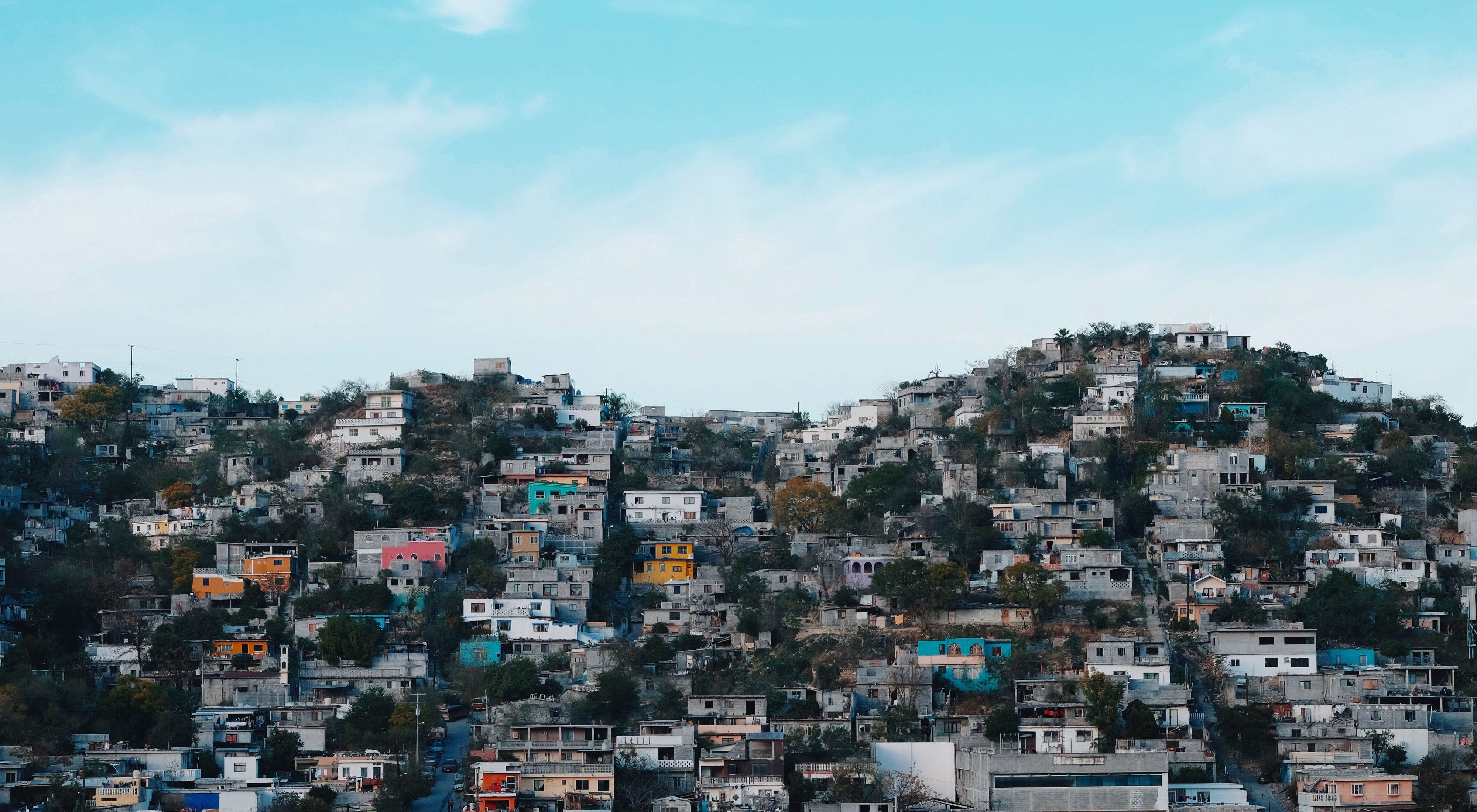 Developed hillsides loom over the city of Monterrey.