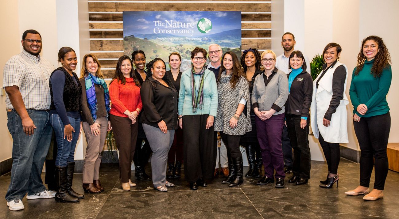 The 12 member Employee Resources Group Steering Committee poses at the Worldwide Office.