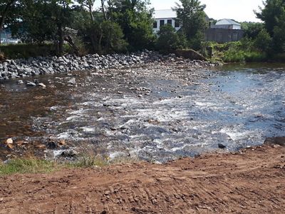 The dam after its removal in 2018. The removal yielded 400 meters of impounded stream restored and 16 km or upstream river connected.
