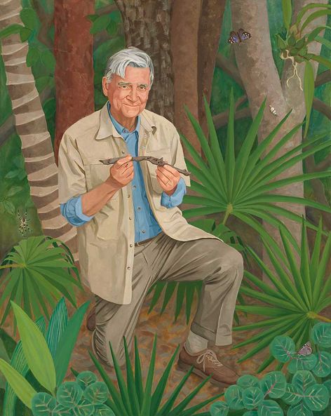 A painting depicts an older gentleman kneeling in a forest and holding a snake.
