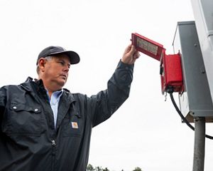 Growers like rice farmer Kotton Guest have found that using new irrigation timers (pictured) save them time in the fields, money--and precious water resources.
