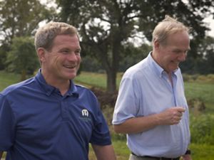 Farmer Trey Hill (left) and landowner Joe Hickman (right) discuss the importance of conservation on Joe’s farmland.