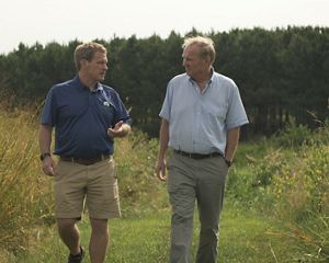 Farmer Trey Hill (left) and landowner Joe Hickman.