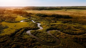 A river winding through farmland.