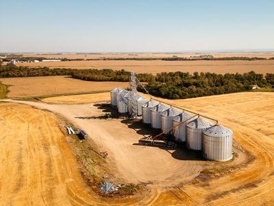 Grain silos in a field.