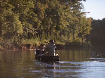 Canoeing through the river.