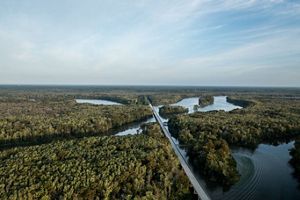 Aerial view of the Roanoke River and a bridge over it.