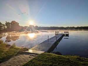 Dock overlooking lake in in Iowa.