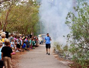 People seeing a controlled burn.