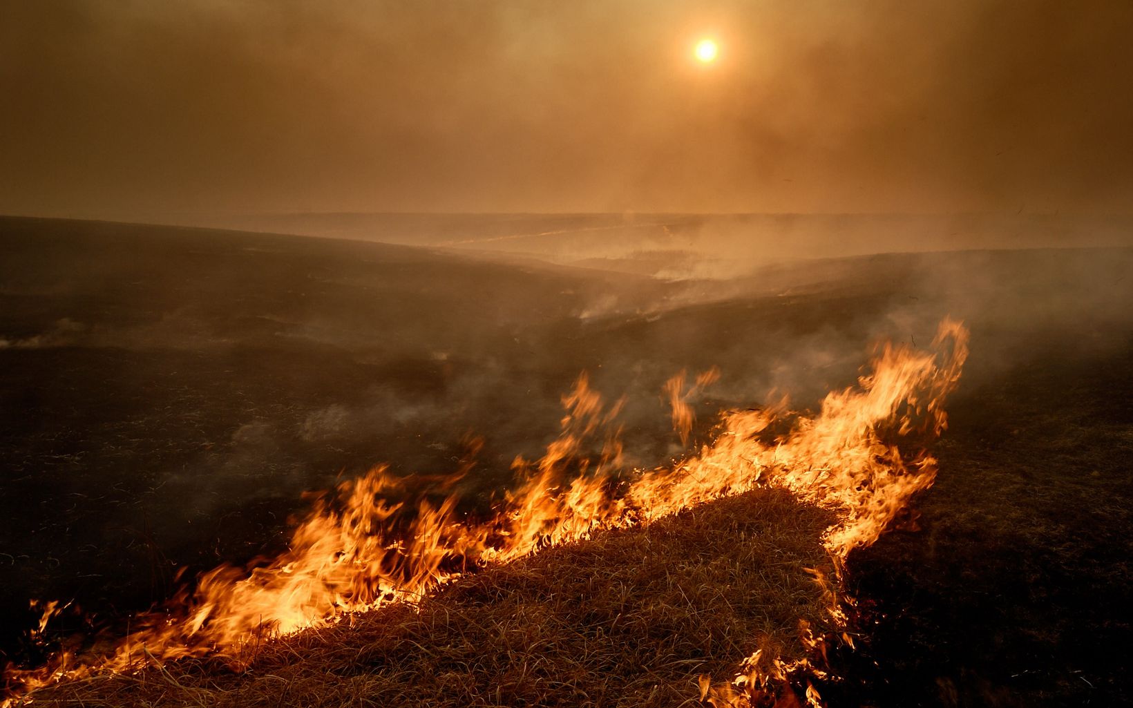 Fire in the Flint Hills Controlled fire helps maintain healthy tallgrass prairie. © Jim Richardson