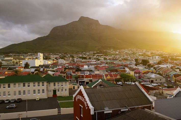 The mountain Devil’s Peak rises behind the suburb of Woodstock.