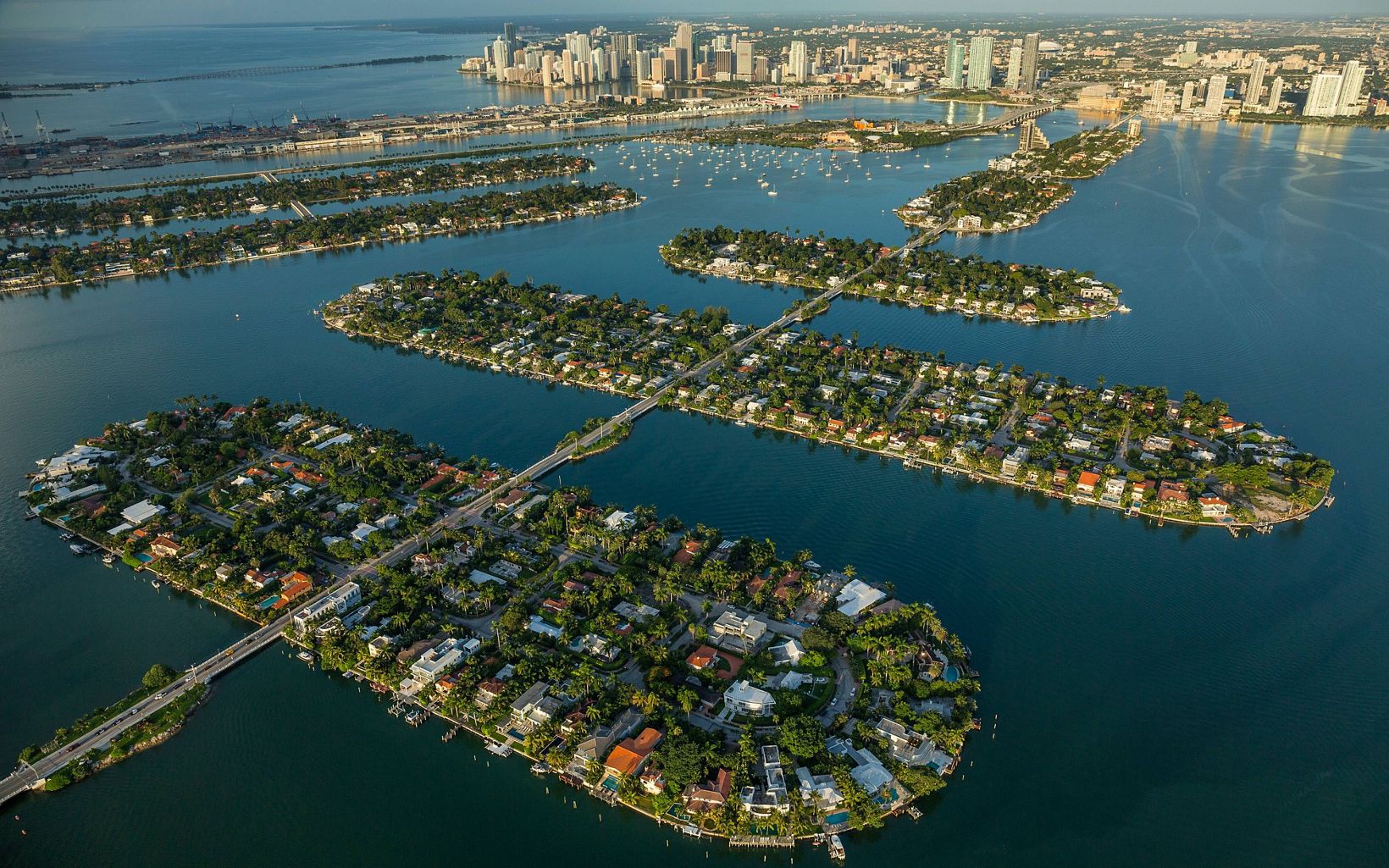 Above Water The Venetian Islands, a chain of human-made islands in Florida’s Biscayne Bay covered with multimillion-dollar homes, sit just 1 to 2 feet above sea level and are especially vulnerable to storm surges. © George Steinmetz