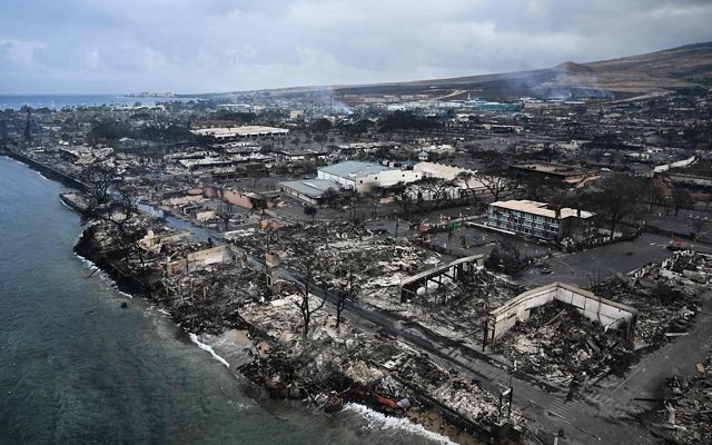 Aerial view of a town with all buildings burned down in a wildfire.