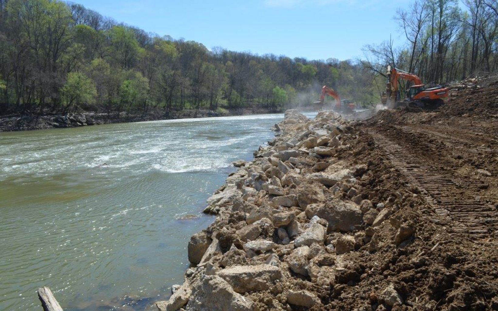 River Restoration   Removal of the dam eliminated a bank erosion threat to drinking water a half-mile downstream in Edmonson County. © The Nature Conservancy