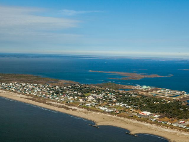 Aerial view of Grand Isle, a barrier island located in the Gulf of Mexico at the mouth of Barataria Bay in Louisiana. 