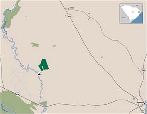 A map features properties, in different shades of green, that will be added to a preserve.