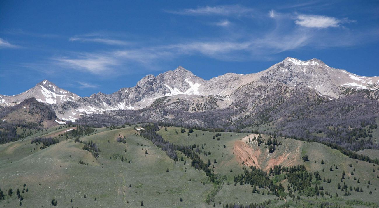 Rugged mountains topped with snow.