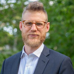 Headshot of Dr. Matthew Schneider-Mayerson. 