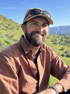 Headshot of Greg Richardson. 