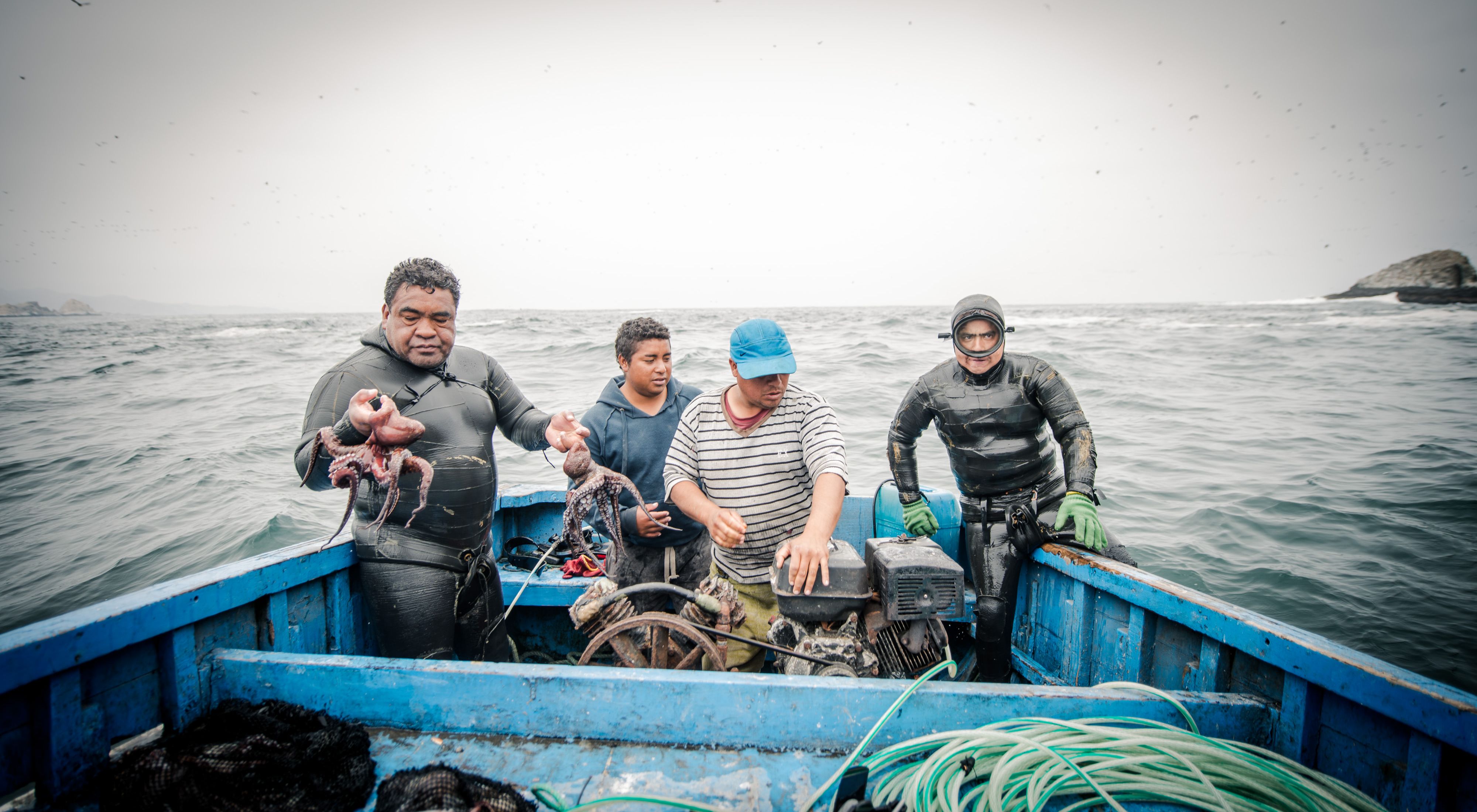 Hector Samillan (left) and crew off the coast of Ancon, Peru.