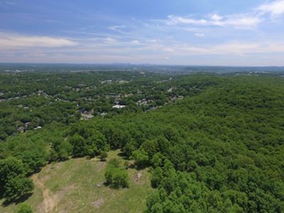 Views of New York City from a mountain summit.