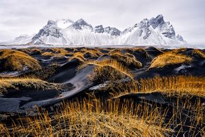 Winter in Stokksnes on the beach with black sand and the majestic mountain, Vestrahorn.