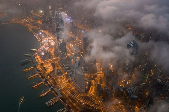 The view of the world famous Victoria Harbour under the clouds in the early morning.
