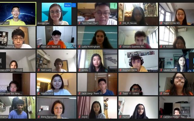 A screen capture of an online webinar that shows many students faces in a grid.