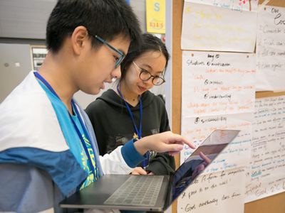 students researching their conservation project.