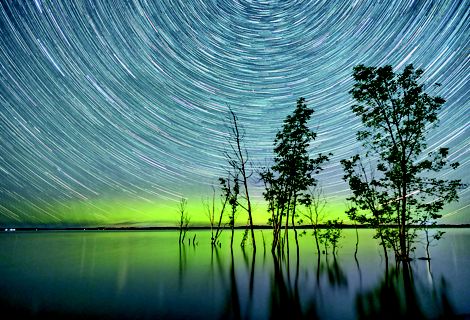 Starry evening night over water