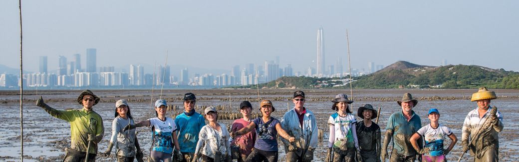 TNC Senior Leaders work together to build five reef structures at Arlington Cove in Mobile Bay, Alabama