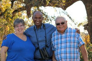 TNC's Dawit Zeleke standing between Lee Ann and Jose Puente.
