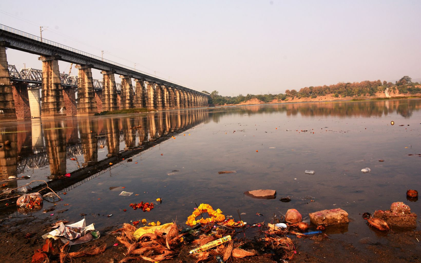 collecting on sides of River Narmada  