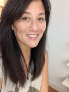 Jana Ireijo paints environmentally themed murals.