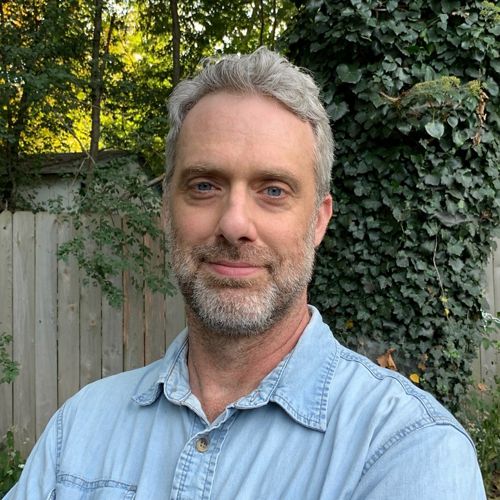 Headshot of John Cougher.