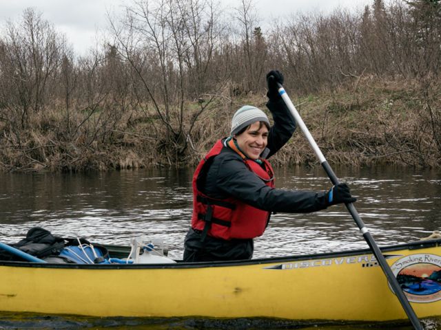Kate Dempsey, TNC in Maine State Director, paddles on the St. John River.