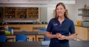 Photo of Kathy Terry in a navy blue polo shirt.