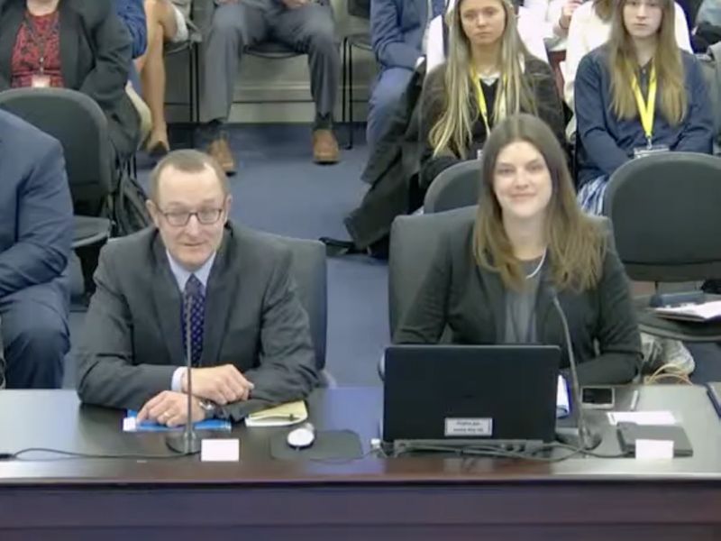 TNC in Kentucky's State Director, David Phemister and Director of External Affairs, Heather Jeffs, sit at a table, testifying during a committee meeting at the Kentucky state capital.