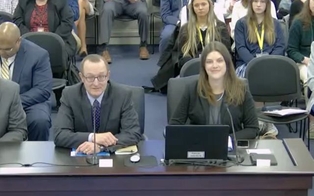 TNC in Kentucky's State Director, David Phemister and Director of External Affairs, Heather Jeffs, sit at a table, testifying during a committee meeting at the Kentucky state capital.