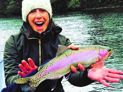 Kerry Landreth Reed holding a fish.