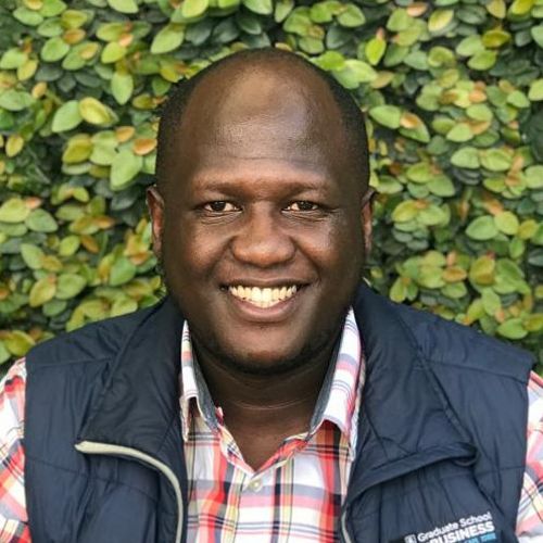 Headshot of Kevin Juma.