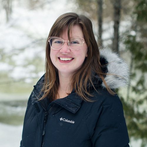 Person standing in nature.