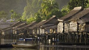 With a shortage of flat coastal land, the Kia community builds homes directly over their reef in the Arnavon Islands.