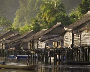 With a shortage of flat coastal land, the Kia community builds homes directly over their reef in the Arnavon Islands.