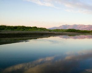 River with mountains in the distance.