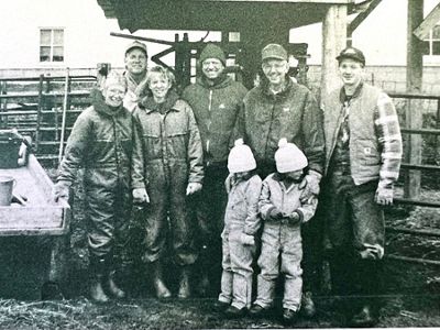 Barry and Carolyn Knapp stand with their family and smile for the camera on their family farm in Westfield, Iowa.