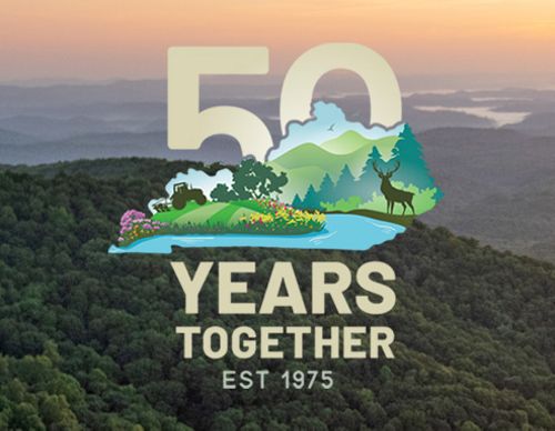 Kentucky's Appalachian Mountains with the graphic for our 50th Anniversary superimposed on the image.
