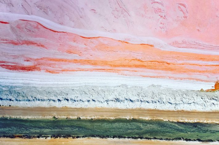 Drone photo showing the pink hues of a pink lake called Hutt Lagoon, Western Australia.