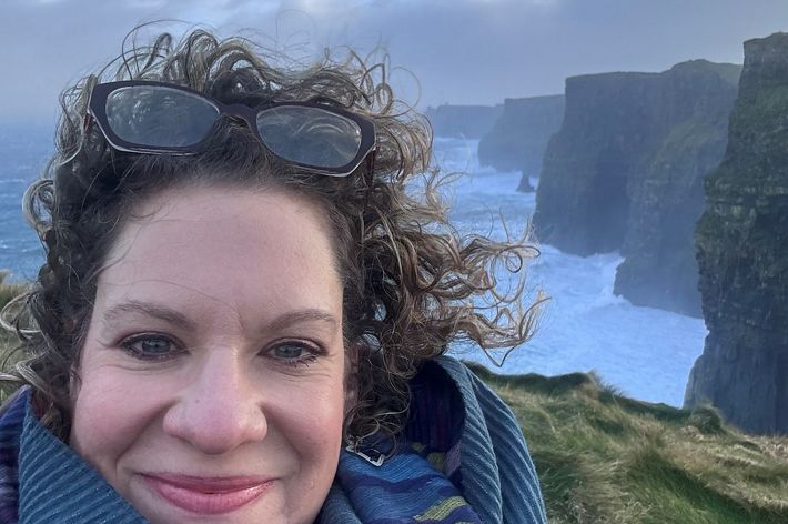 A selfie of Lori Brennan at the Cliffs of Moher.