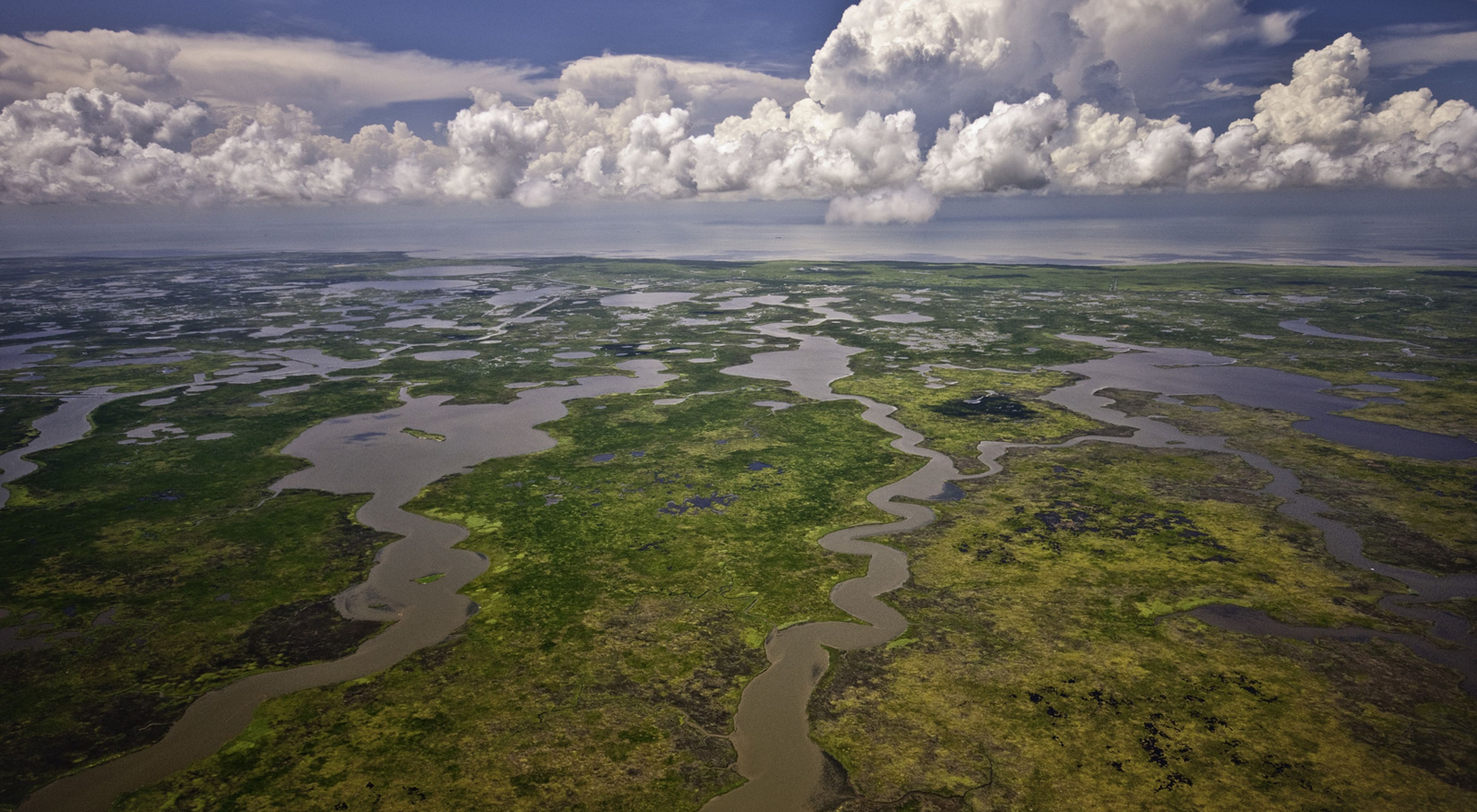 Aerial view of wetlands and marshlands that comprise the Mississippi River delta on the Louisiana Gulf Coast